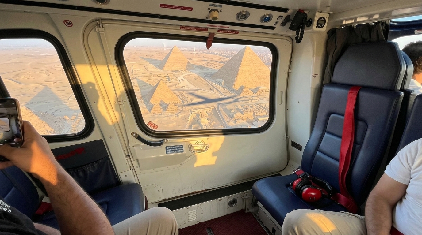 View from inside the helicopter cabin across the desert to the Giza pyramids